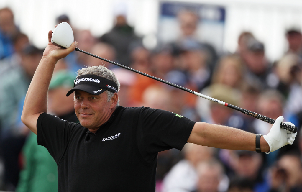 British Open champion Darren Clarke knows the importance of properly stretching before the round.